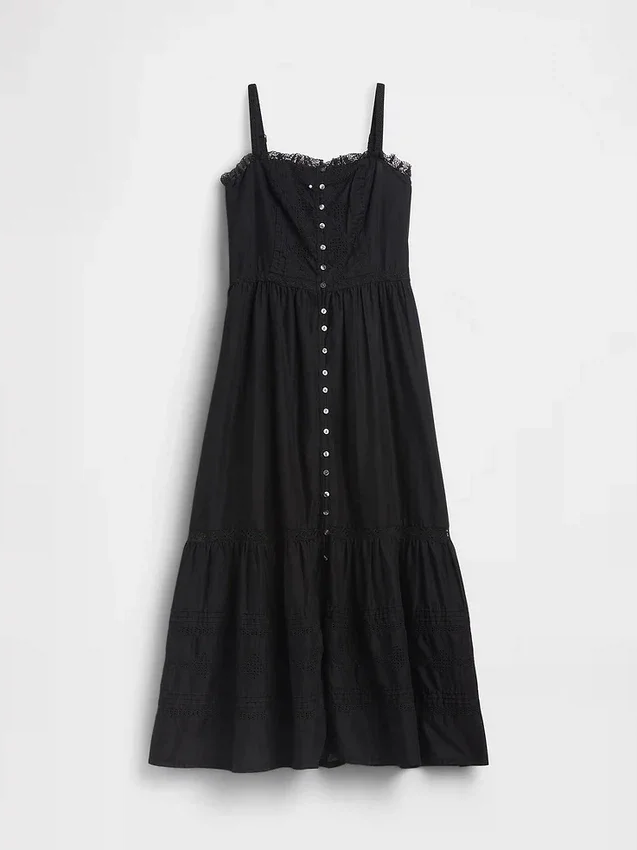 Vestido largo con volantes y ojales