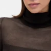 Vestido largo de punto con cuello alto transparente