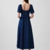 Vestido largo de vaquero con mangas abullonadas y cierre frontal con botones