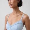 Vestido largo tipo corsé con costuras de denim