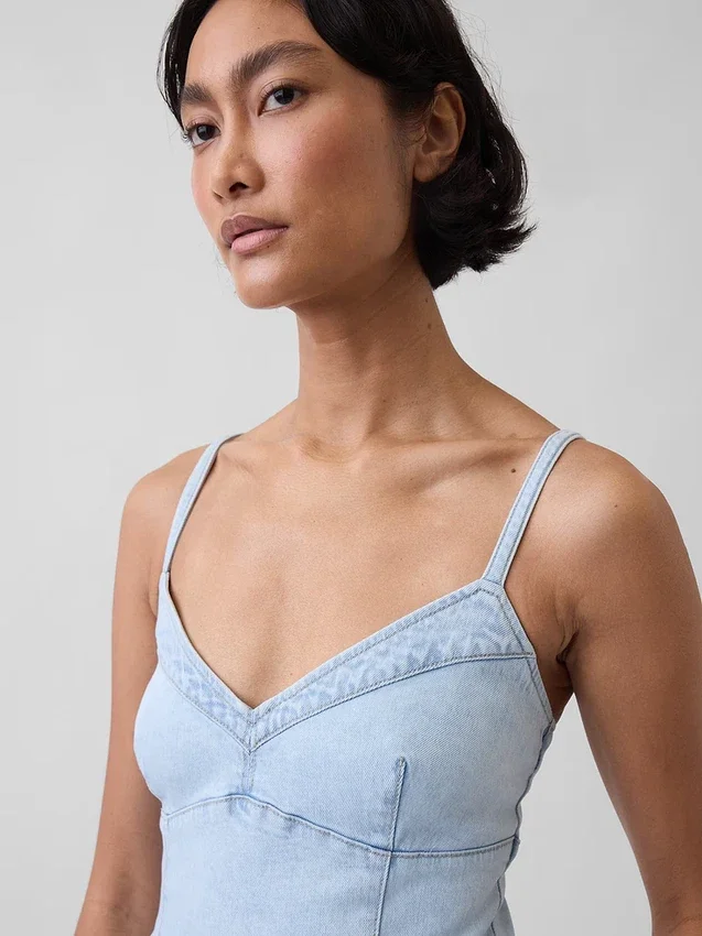 Vestido largo tipo corsé con costuras de denim