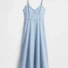 Vestido largo tipo corsé con costuras de denim