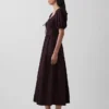 Vestido largo tipo corsé con mangas abullonadas