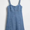 Vestido mini con paneles de denim