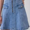 Vestido mini vaquero con cremallera frontal y costuras