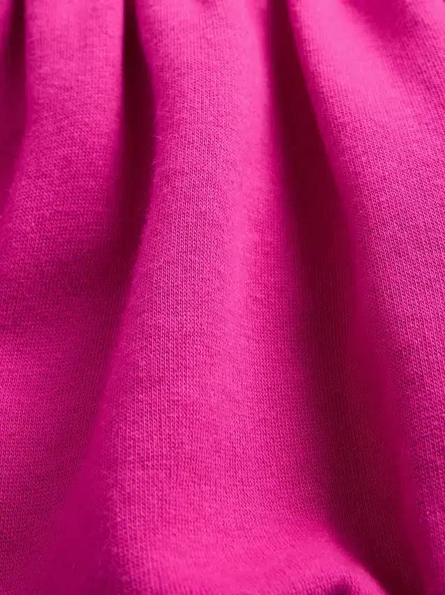 Vestido sudadera con capucha oversize para niña
