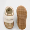 Zapatillas con purpurina y pelo vegano para niños pequeños